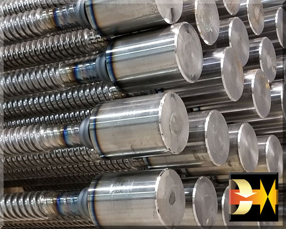 A Stack of Friction Welded Threaded Rod Welments